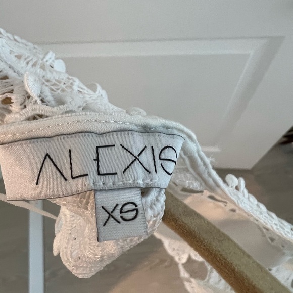 Gorgeous Alexis lace peplum cut out blouse - Picture 4 of 4